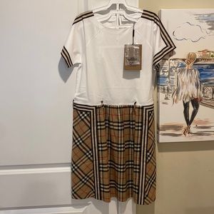 Brand new girls Burberry dress bought it for $475 asking price $225